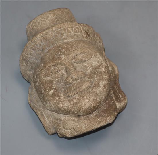 A Cambodian Khmer carved sandstone Buddha head